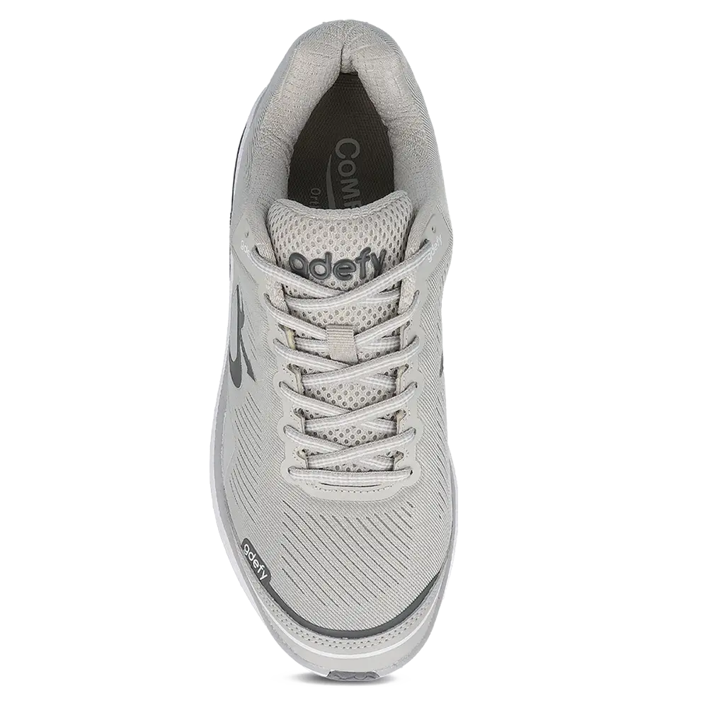 Mighty Walk grey sneaker with breathable mesh upper and VersoShock® technology.
