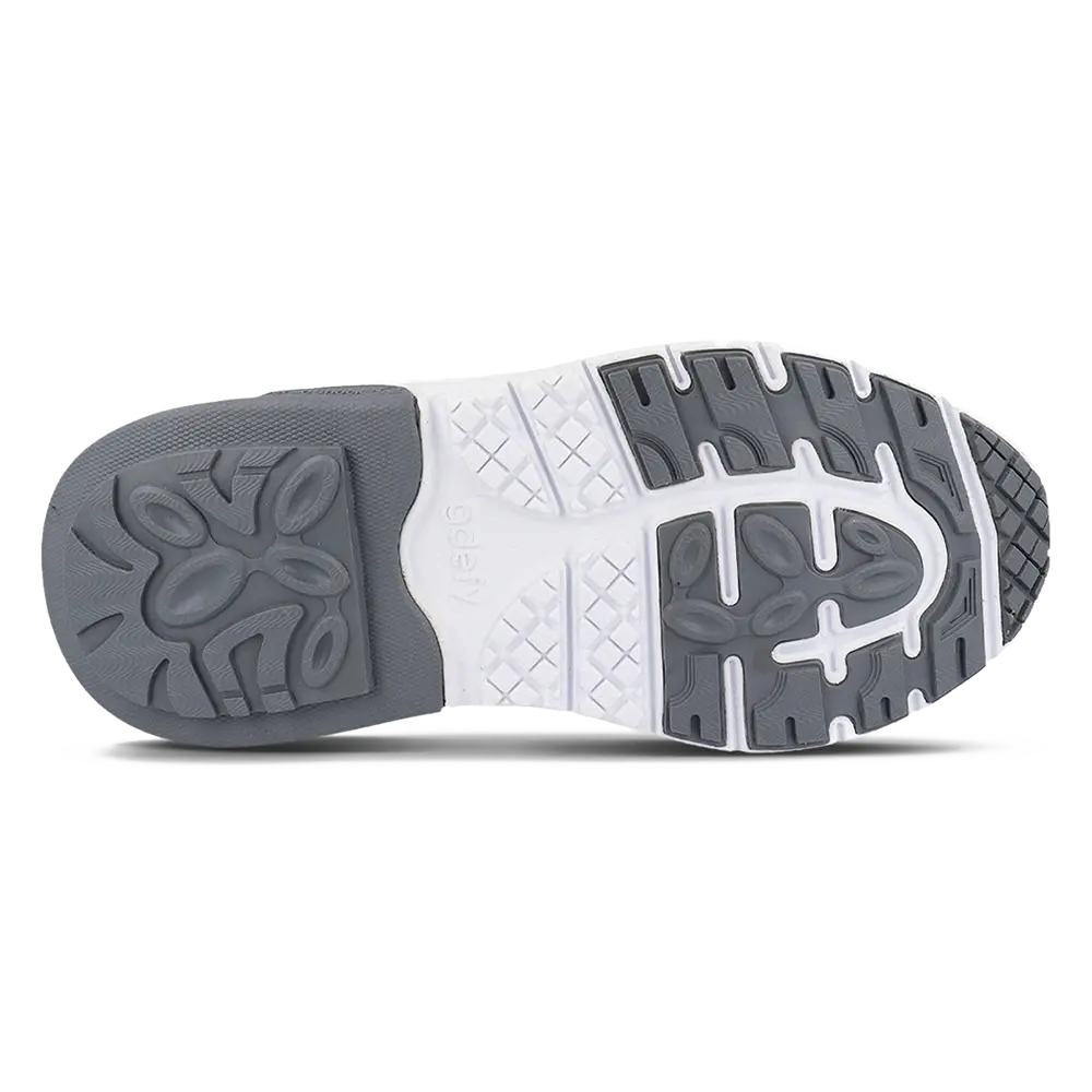 Mighty Walk sneaker outsole with VersoShock® technology for pain relief.