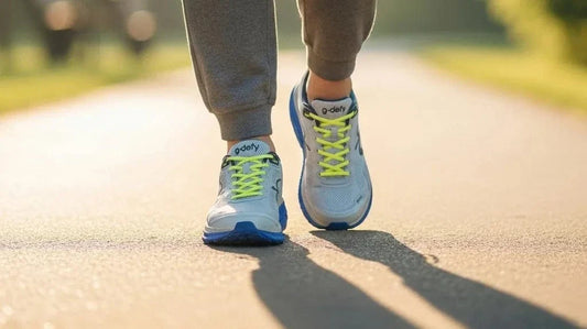 G-Defy Mighty Walk supportive walking shoes mid-stride on a sunlit path