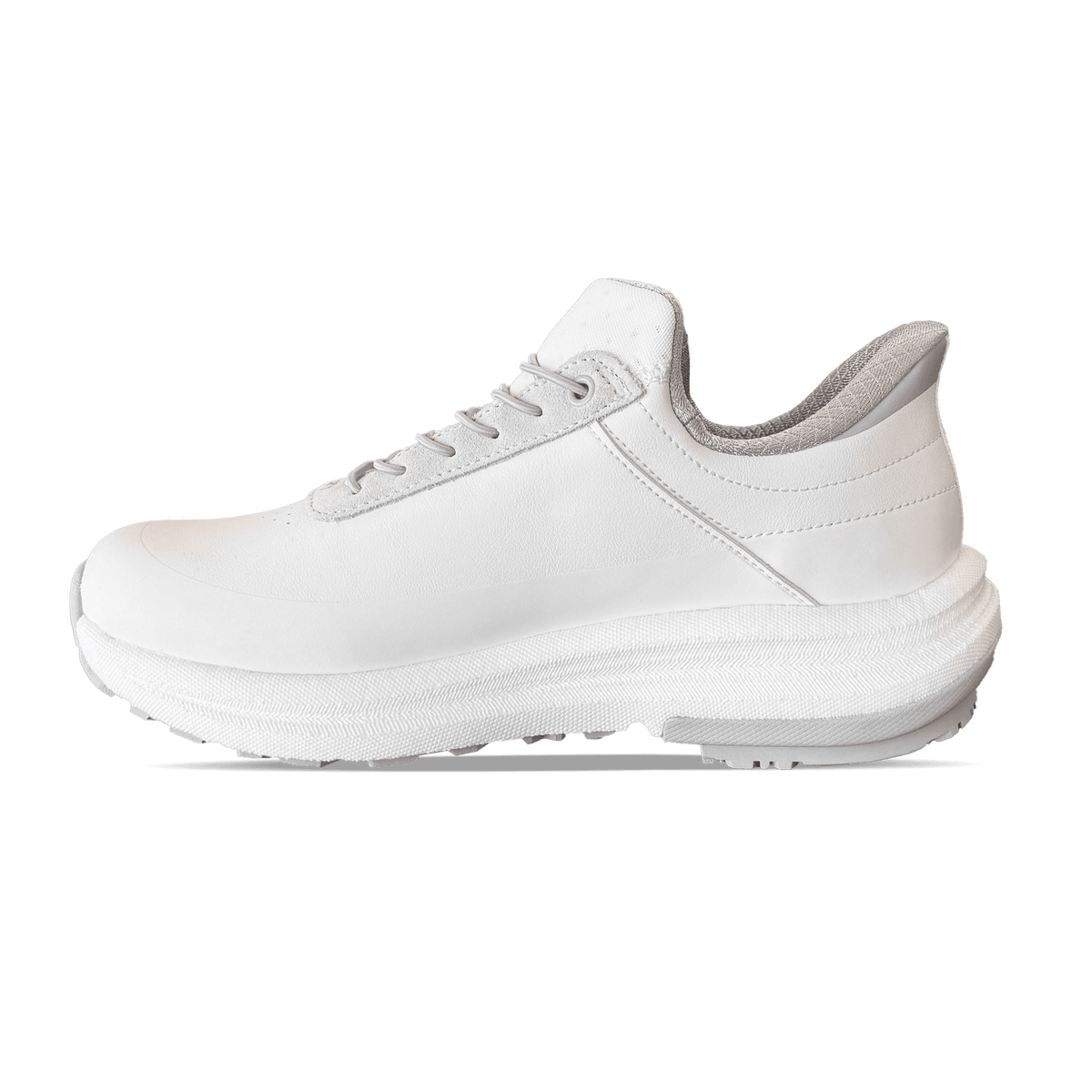 White LumaWalk sneaker with gray accents, leather upper, suede lace panel, and a thick, textured white sole, viewed from the 