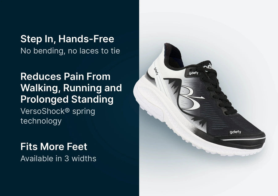 Black and white athletic shoe with a hands-free design, thick white sole, and 'gdefy' branding on the side.