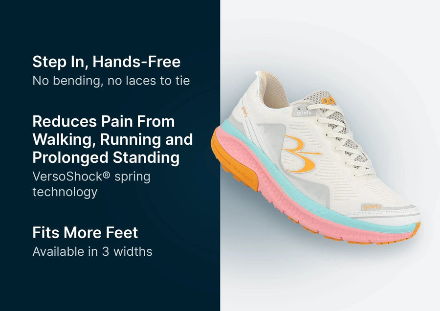 White GDEFY running shoe with a vibrant pink, light blue, and orange layered sole.