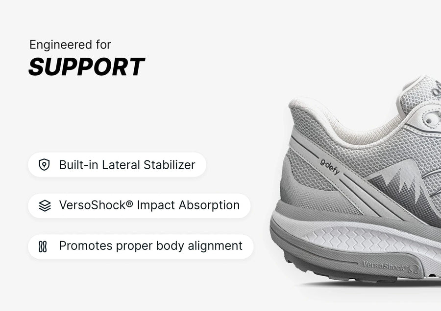 Grey athletic shoe engineered for support, featuring a built-in lateral stabilizer and VersoShock® impact absorption.