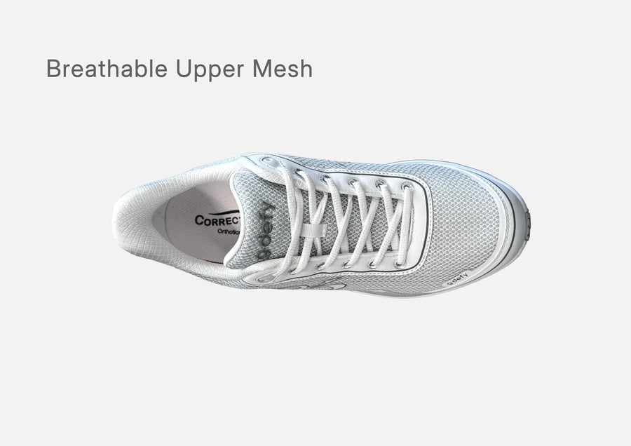 Top view of the white and silver g-defy MightyWalk slip-on sneaker showing its breathable upper mesh.