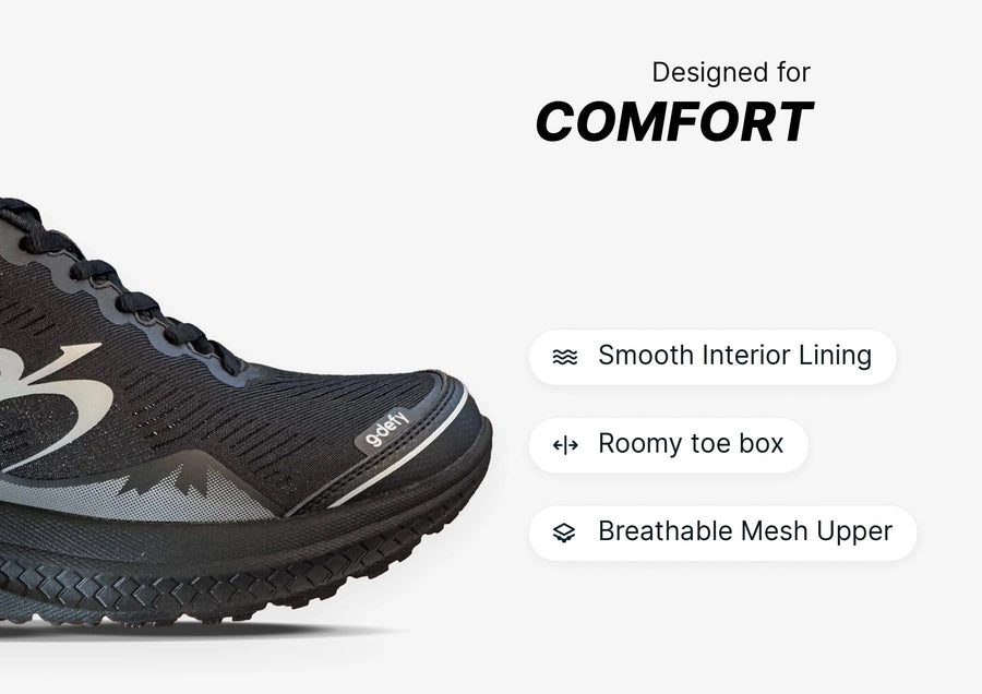 Black running shoe with a breathable mesh upper, textured sole, and roomy toe box, designed for comfort.