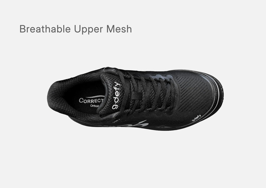 Top view of the black g-defy MightyWalk men's slip-on sneaker showing its breathable upper mesh.