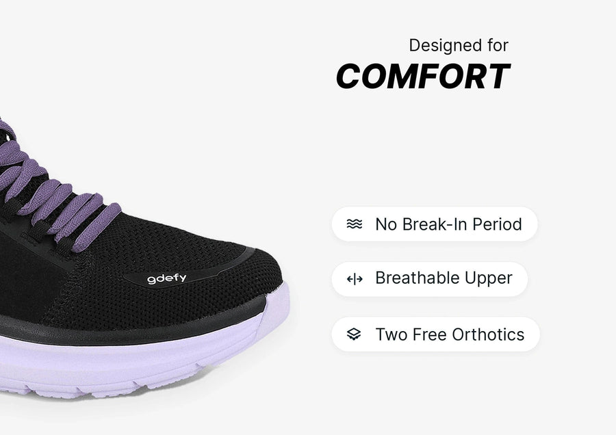Black gdefy sneaker with purple laces and light purple sole, featuring a breathable upper for comfort.