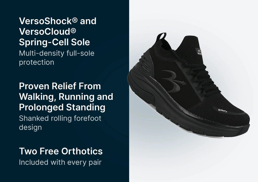 Black GDEFY athletic shoe with a mesh upper, thick VersoShock sole, and a prominent side logo.