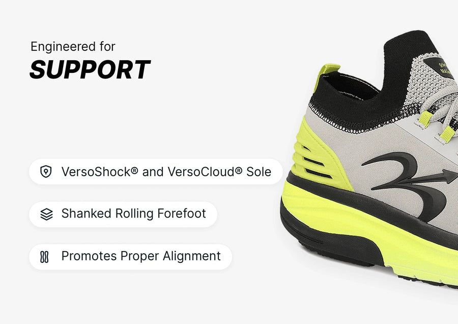 Athletic shoe in grey and neon yellow, showcasing its VersoShock and VersoCloud Sole for enhanced support and alignment.