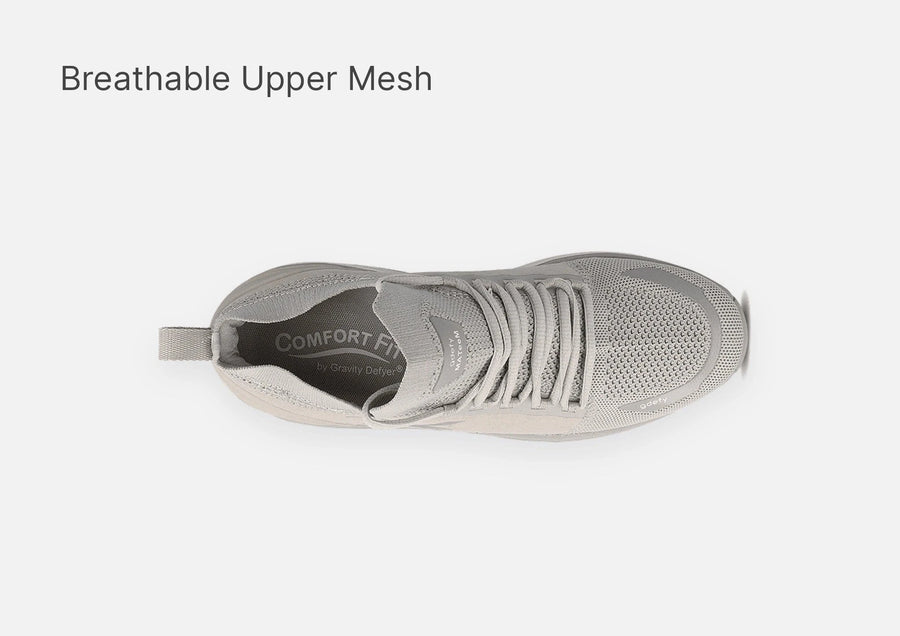 Light gray athletic shoe, top-down view, highlighting the breathable mesh upper and Comfort Fit insole.