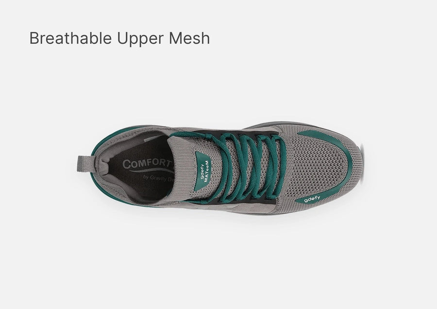 Grey athletic sneaker with teal laces and trim, showcasing the breathable mesh upper from a top-down view.
