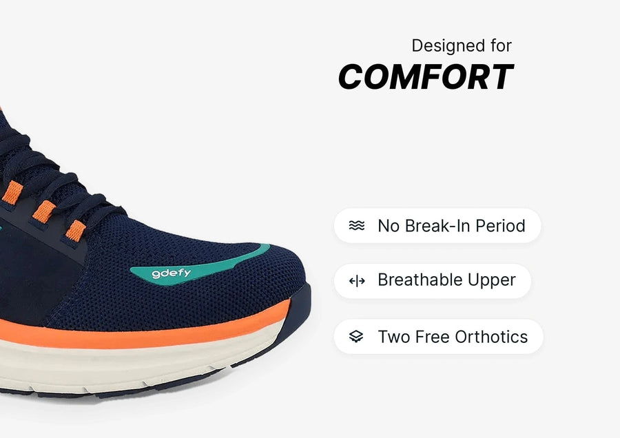 Navy blue running shoe with orange accents, white sole, and breathable upper, designed for comfort.
