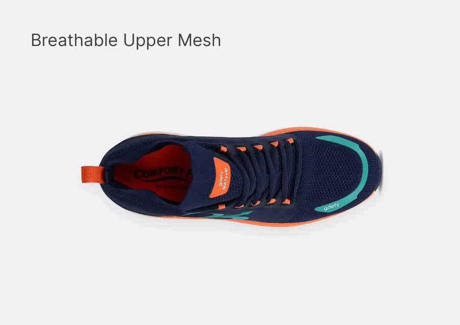 Navy blue running shoe with breathable mesh upper, orange laces, and teal accents, viewed from above.