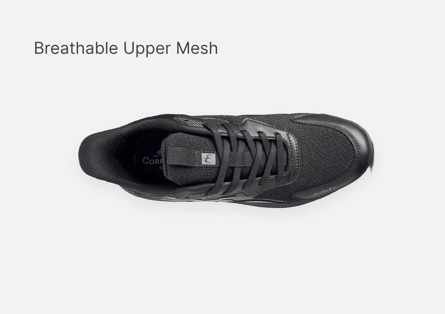 Black athletic shoe with a breathable mesh upper, shown from a top-down perspective on a light background.