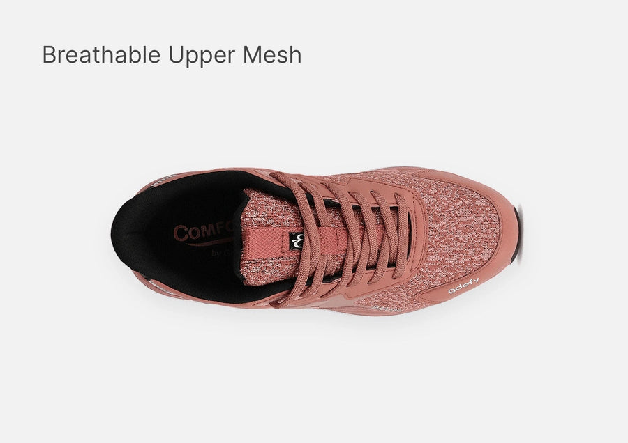 Single rose gold running shoe, viewed from above, showcasing its breathable mesh upper and textured surface.