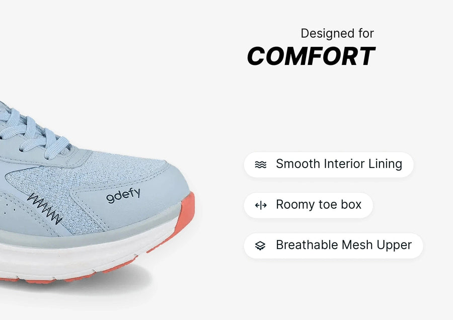Light blue sneaker designed for comfort, featuring a breathable mesh upper, roomy toe box, and smooth interior lining.