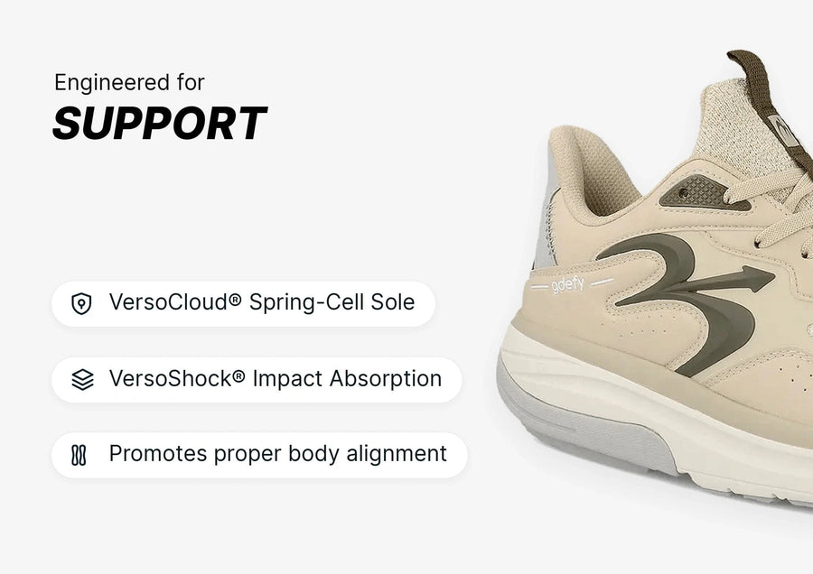 Beige and grey athletic shoe with visible VersoCloud® Spring-Cell Sole and VersoShock® Impact Absorption for support.