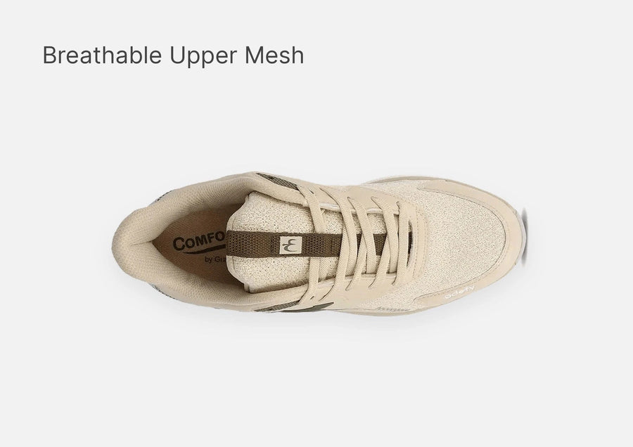 Top-down view of a beige sneaker featuring a breathable mesh upper, light laces, and a brown accent strap.