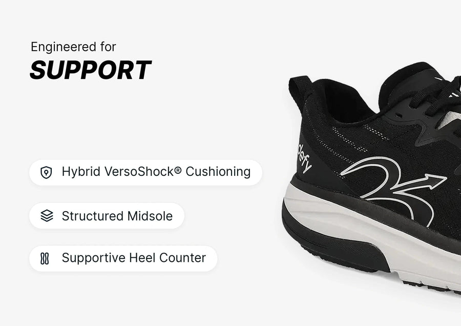 Black athletic shoe with white midsole, highlighting support features like Hybrid VersoShock® Cushioning and a structured des
