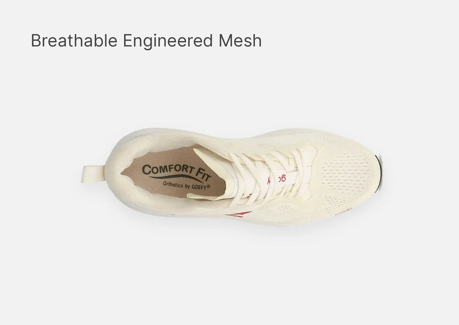 Off-white running shoe from a top-down view, showcasing breathable engineered mesh upper and Comfort Fit insole.