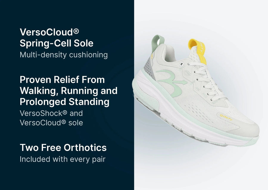 White G-Defy running shoe with mint green and yellow details, featuring a multi-density VersoCloud Spring-Cell sole.