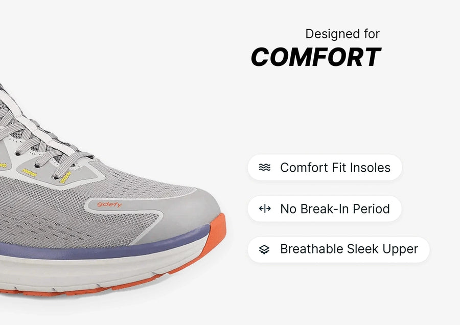 Gray running shoe with orange and purple accents, highlighting comfort fit insoles and breathable upper.