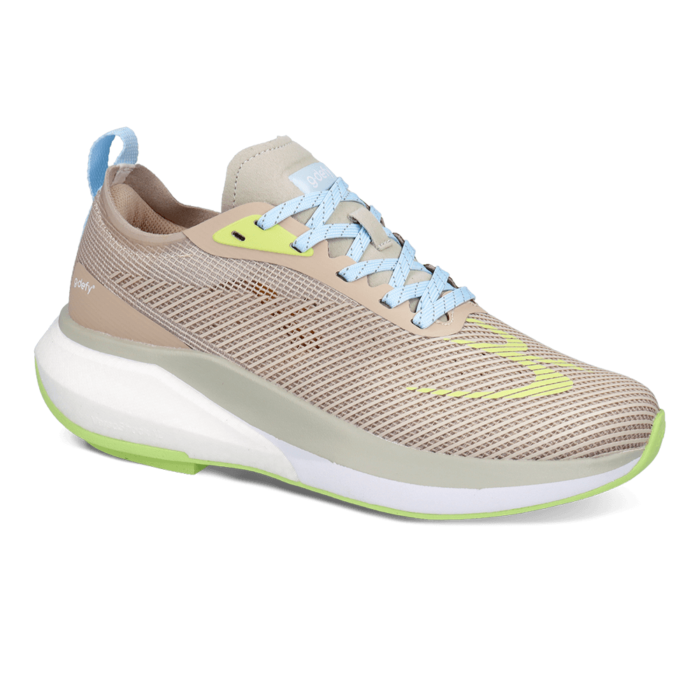 Beige mesh running shoe with light blue laces, lime green accents on the sole and logo, and a thick white midsole, shown at a