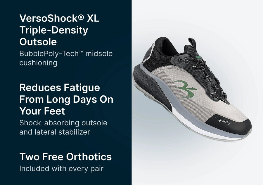 G-Defy sneaker in dark gray and light gray with a green logo, featuring a thick VersoShock XL triple-density outsole.