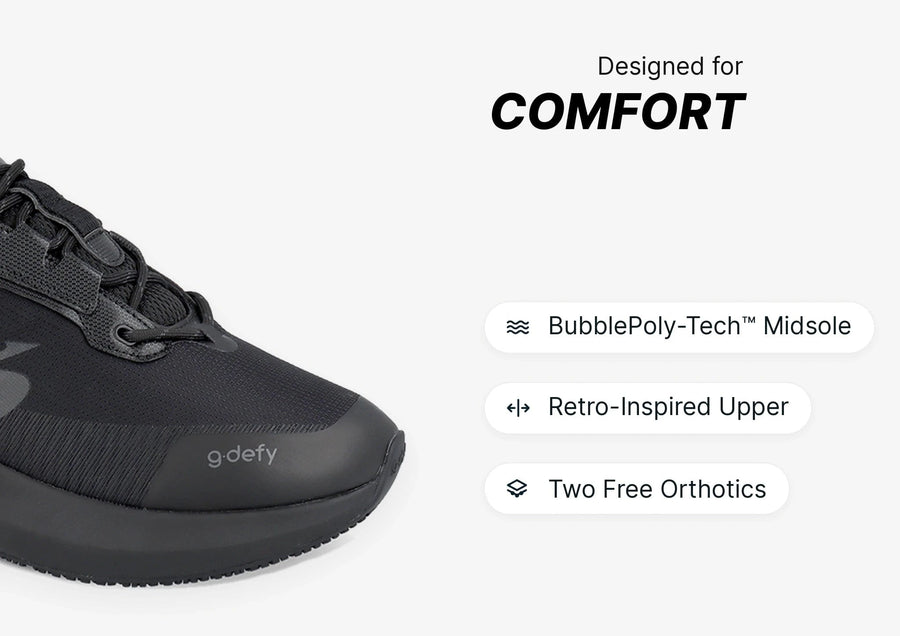 Black g.defy athletic shoe featuring a mesh upper, thick BubblePoly-Tech midsole, and retro-inspired design, emphasizing comf