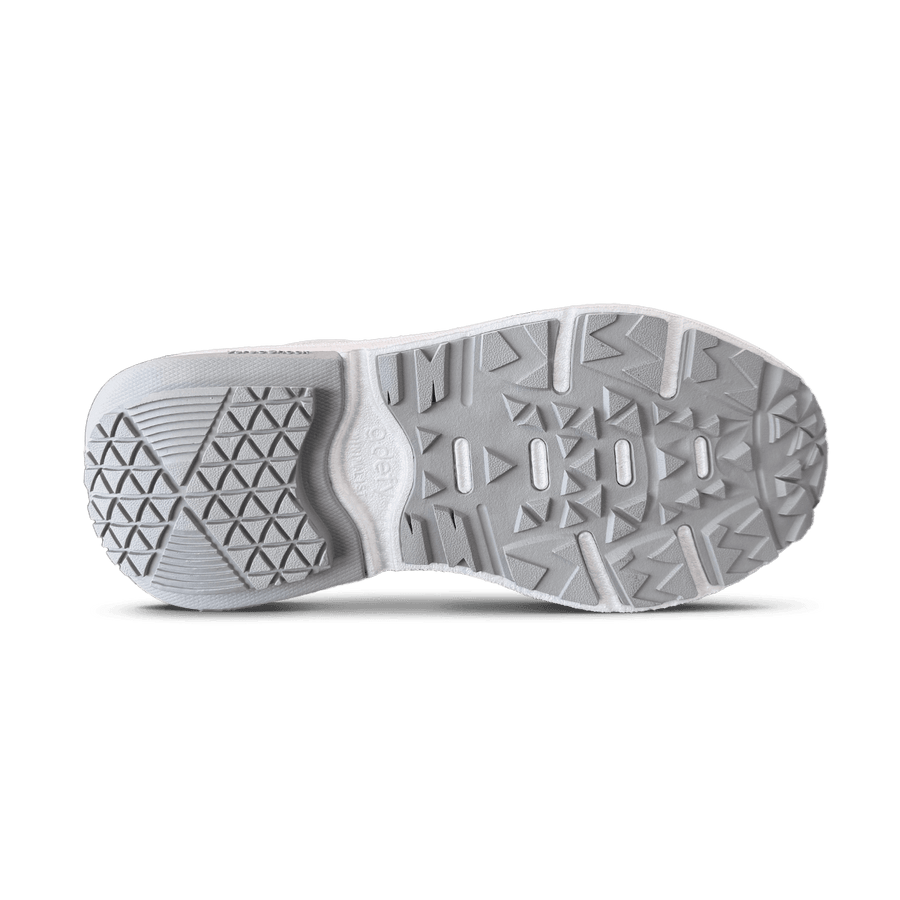 White sneaker sole with a light gray textured rubber tread pattern for grip. The "Oden" brand name is visible on the arch.