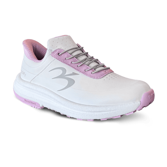 White athletic sneaker with pink lining and trim, gray laces, and a thick, textured white VersoShock sole.