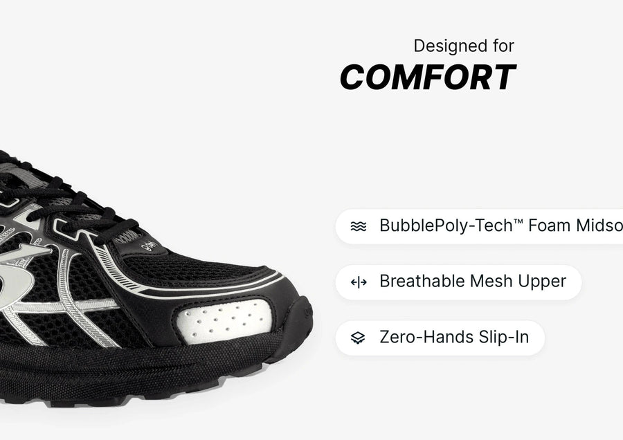 Black and silver athletic shoe featuring a breathable mesh upper and BubblePoly-Tech Foam Midsole for ultimate comfort.